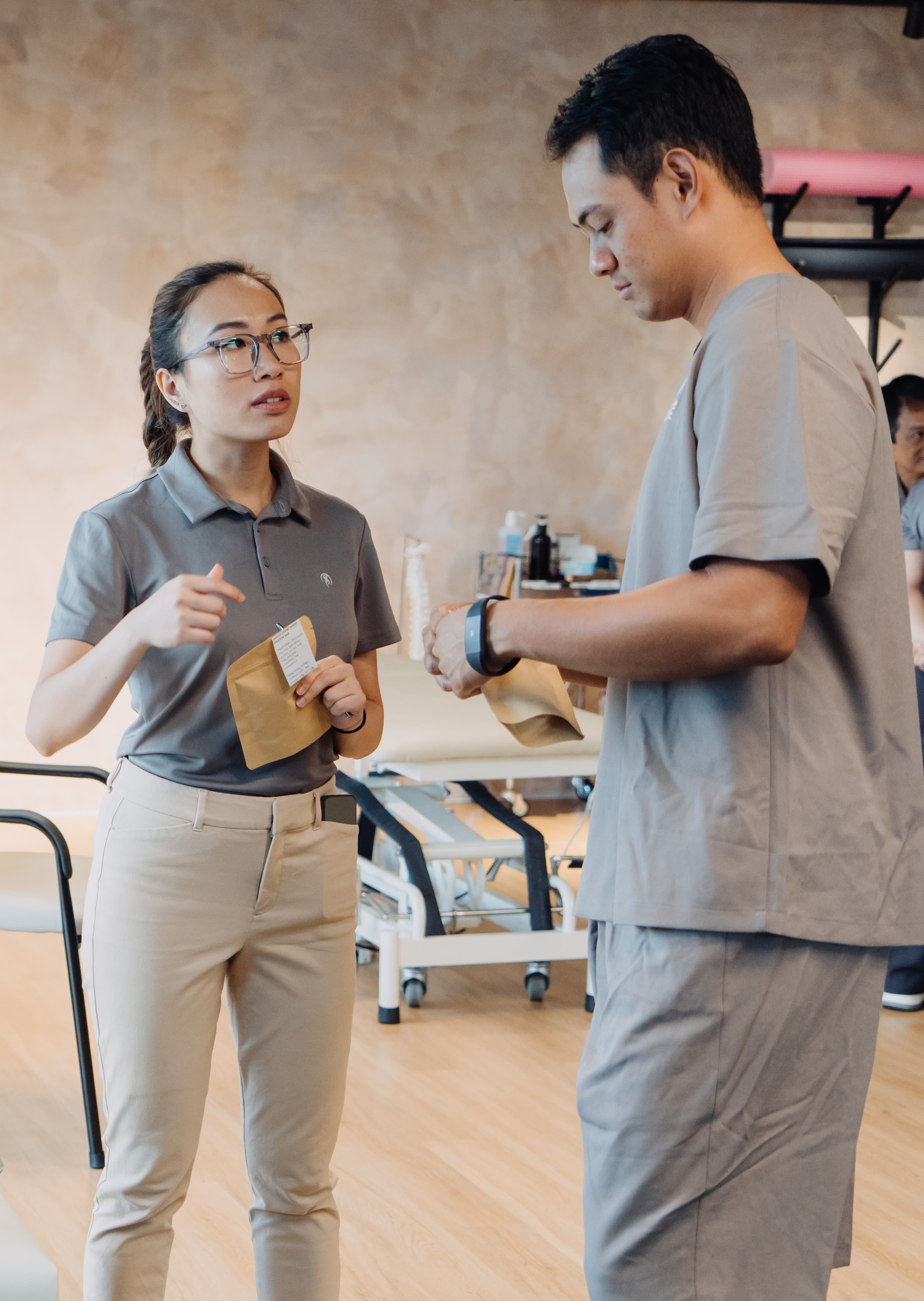 Practitioner examining patient during consultation session